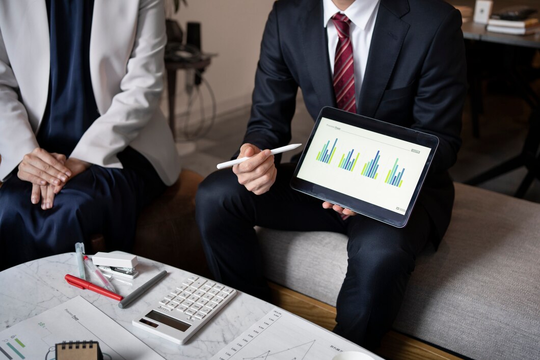business-people-working-with-ipad-high-angle_23-2150103567